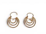 a pair of gold hoop earrings on a white background