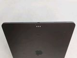 a close up of an apple ipad on a white surface