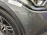 a close up of a car ' s bumper with a sticker on it