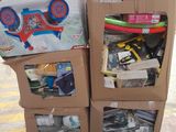 two boxes of toys sitting on a pallet in a warehouse