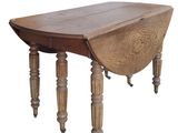 the table is made of wood and has turned legs