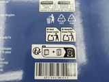 a blue box with stickers on it sitting on a table