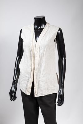 an image of a mannequin wearing a white vest and black pants