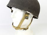 an old helmet on a mannequin head on a white background