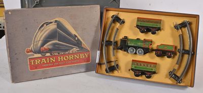 a box with a train set in it on a table