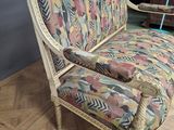 a couch that is sitting on the floor in a room