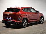 the rear end of a red toyota rav parked in a garage
