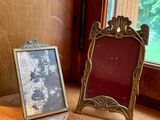 a picture of a picture frame and a picture frame on a window sill