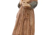 figurine of a woman holding a baby in her arms