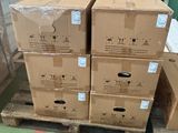 many boxes stacked on pallets in a warehouse