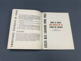 an open book with a black and white image of a man ' s face on it