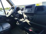 the interior of a car with a steering control and dashboard controls