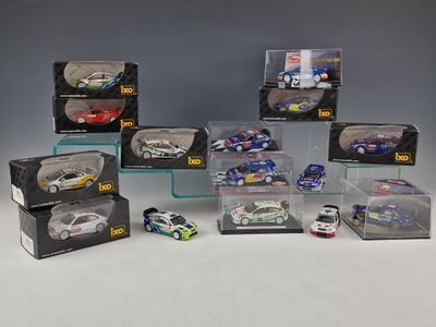 a lot of toy cars that are in a display case