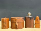 several different types of wooden containers are lined up on a table