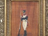 painting of a man in uniform holding a rifle in a gold frame