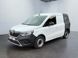 the white van is parked in a large room with a ceiling fan
