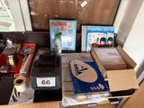 a desk with a lot of office supplies on it