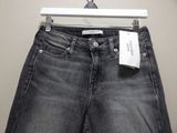 a close up of a pair of jeans on a hanger