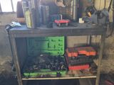 a workbench with tools on it in a garage