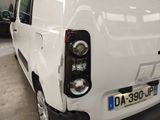 a white van that is parked in a garage