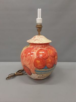 HUBERT OLIVIER. Grande lampe en faïence à décor polychrome p…