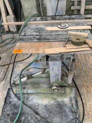 a picture of a table with a saw on top of it