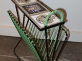 a magazine rack with a magazine holder on top of it