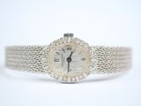 an image of a lady ' s wrist watch with a diamond bezel