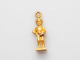 a gold figurine of a man holding a baby in his arms