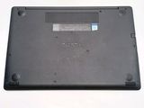 a close up of a laptop on a white surface