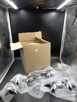 a box with a box of silver items inside of it