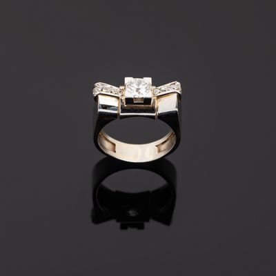 Bague en or gris 750°°° et platine 850°°° (têtes d’aigle et …