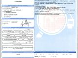 a close up of a document with a picture of a person on it