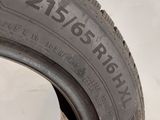 a close up of a tire on a white surface