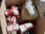 a cardboard box filled with boxes of food and other items