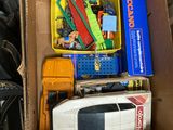 a box full of assorted toys and other items