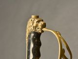 a close up of a cane with a lion head on it