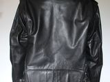 le dos d'une veste en cuir noir sur un mannequin, un mannequin, un mannequin, un mannequin, un mannequin, un mannequin, un mannequin, un mannequin, un mannequin, un mannequin, un mannequin, un mannequin, un mannequin, un mannequin, un mannequin, un mannequin, un mannequin, un mannequin, un mannequin, un mannequin, un mannequin, un mannequin, un mannequin, un mannequin, un mannequin, un mannequin, un mannequin, un mannequin, un mannequin, un mannequin, un mannequin, un mannequin, un manne