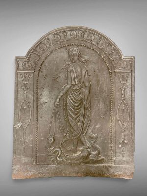 an image of a stone plaque with a woman holding a bird