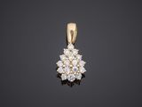 an 18k yellow gold diamond cluster pendant