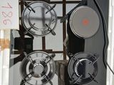 une photo d'une plaque de cuisson comportant de nombreux brûleurs