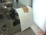 a picture of a machine that has a roll of paper on it