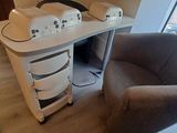 an image of a computer desk with a chair in front of it