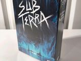 the box for the board game subterra is sitting on a table