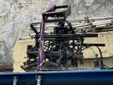 a large machine that is sitting on the back of a truck