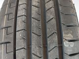 the tire of a car is shown on a white surface