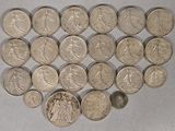 a lot of coins that are laying on a table