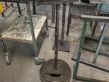 several pieces of metal are stacked on top of each other in a room