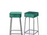 pair of green velvet stools with chrome legs