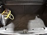 a trunk of a car with luggage in the trunk